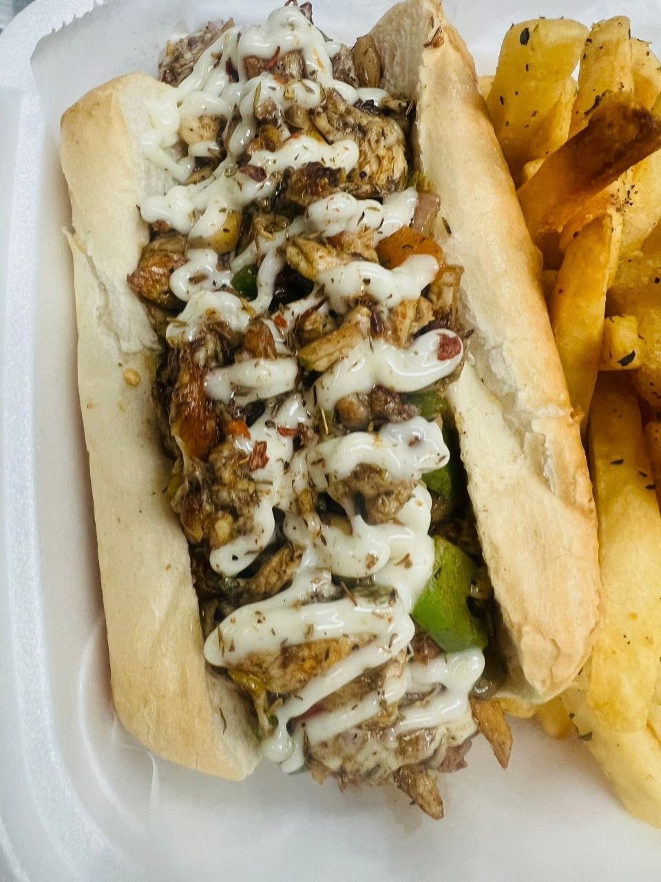 Loaded sandwich with seasoned potato side